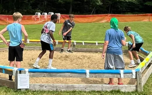 a group of people playing a sport