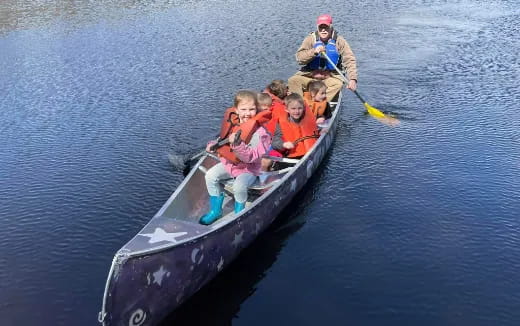 a group of people in a boat