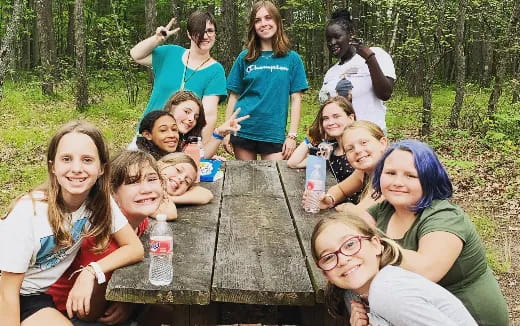 a group of people posing for a photo