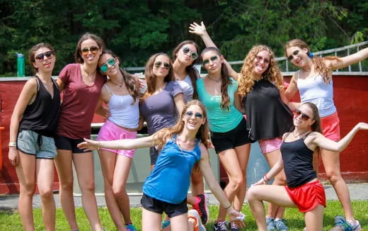 a group of women posing for a photo