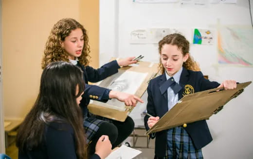 a group of girls in a classroom