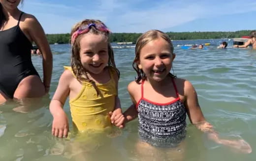 a couple of girls in the water