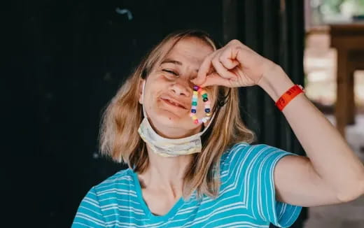 a person with a toothbrush in the mouth