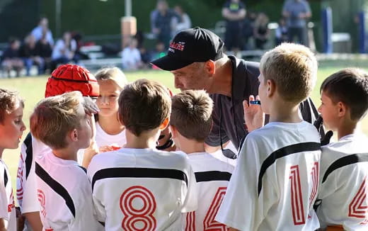 a group of people in sports uniforms