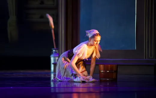 a person sitting on a stage