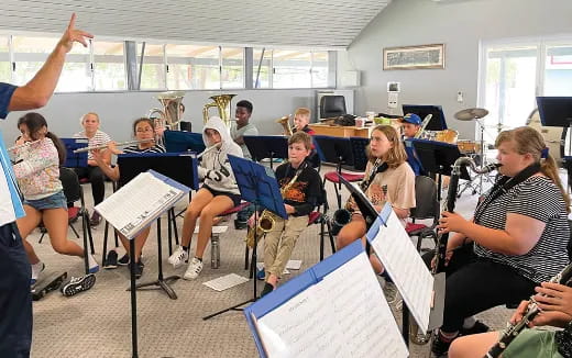 a group of people playing instruments