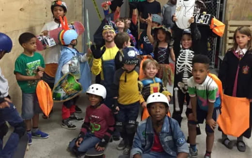 a group of children wearing helmets