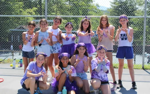 a group of girls posing for a photo