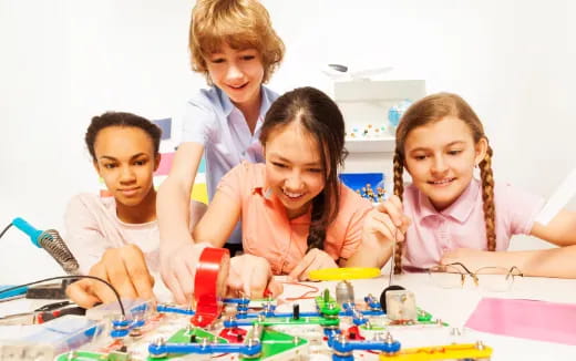 a group of children playing with toys