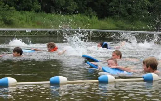 a group of people in a pool