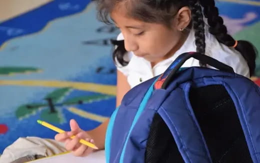 a person painting on a canvas