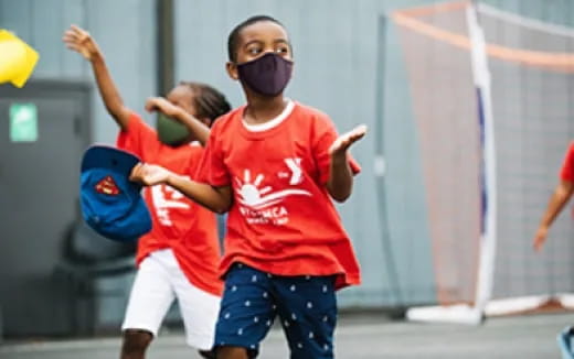 a group of kids playing football