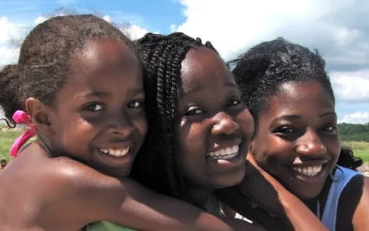 a group of people posing for the camera
