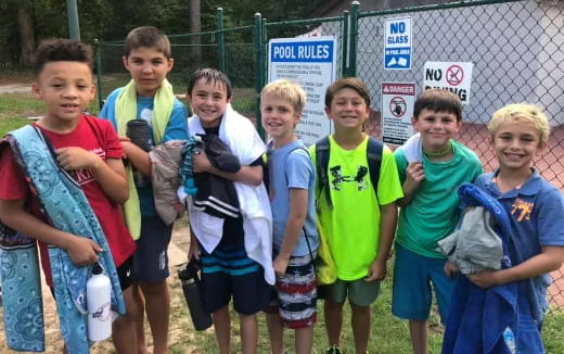 a group of boys posing for a photo