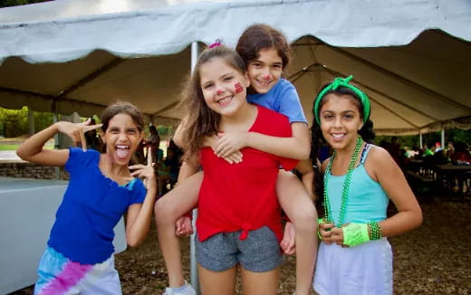 a group of people posing for the camera