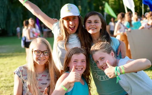 a group of girls posing for a photo