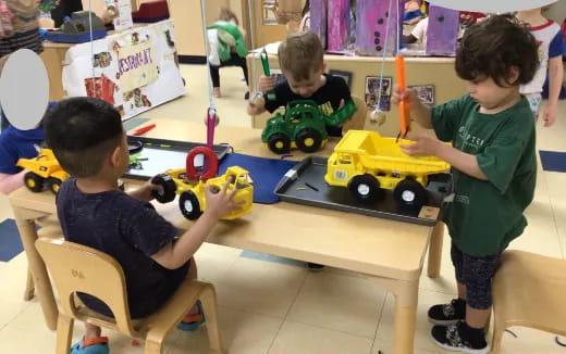 a group of kids playing with toys