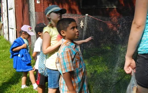a group of children standing outside