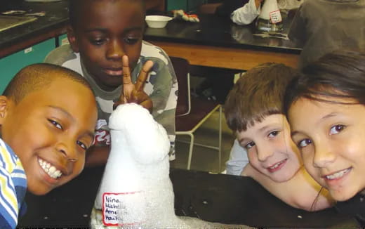 a group of boys taking a selfie