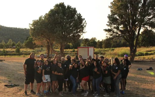 a group of people posing for a photo