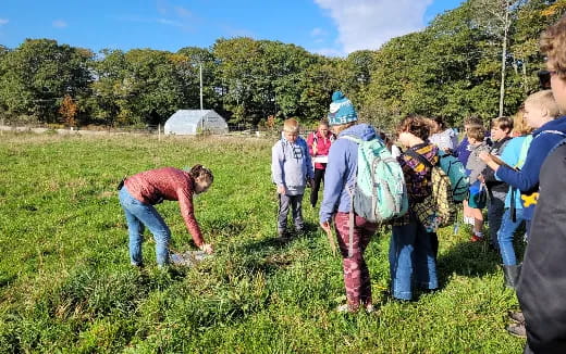a group of people in a field
