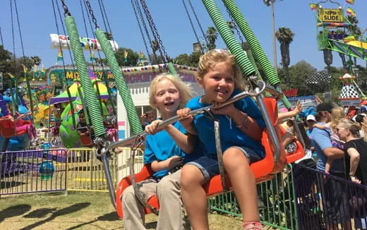 a couple of children on a ride