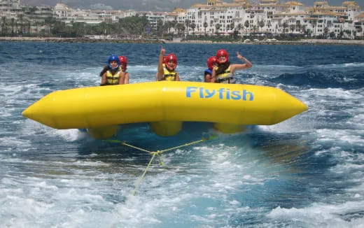 a group of people in a raft