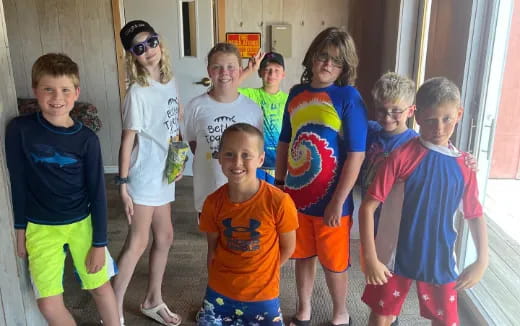 a group of children posing for a photo