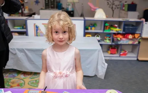a little girl in a dress