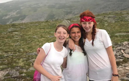 a group of women posing for a photo