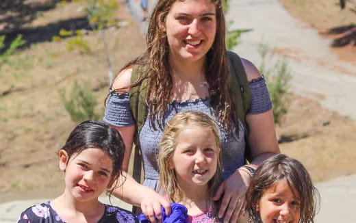 a group of people posing for the camera