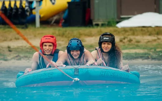 a group of people in a raft