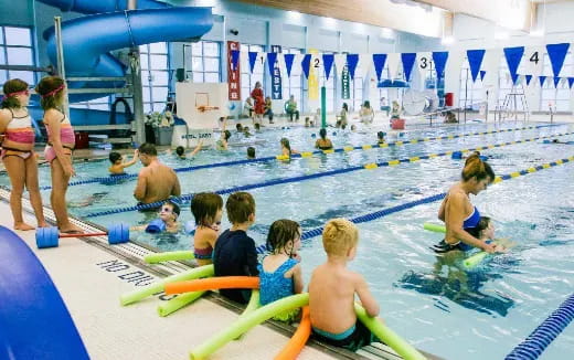 a group of people in a pool