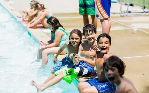 a group of people in a pool