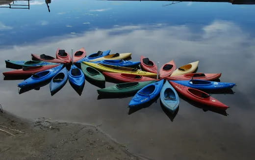 a group of boats on a beach