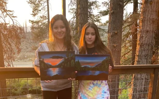 two women standing next to each other