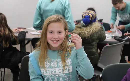 a girl with a bow on her head