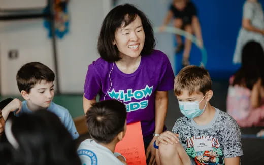 a person with a group of kids