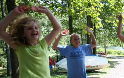 a person with the arms raised