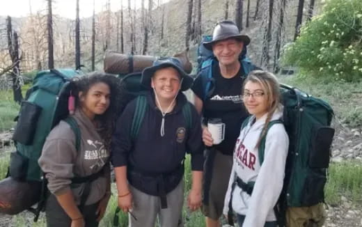 a group of people posing for a photo