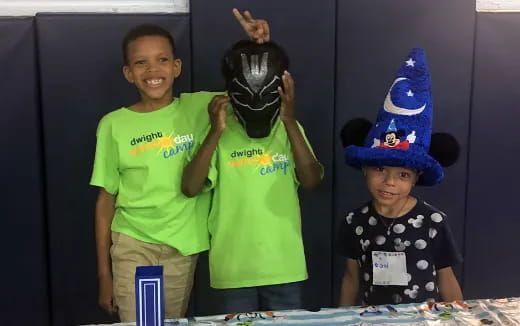 a group of kids wearing clothing