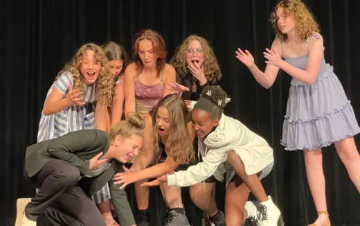 a group of people on a stage
