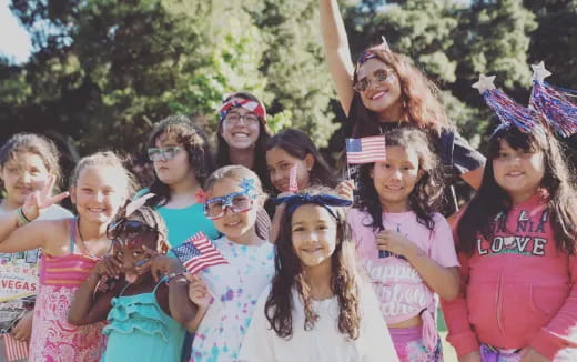 a group of girls posing for a photo
