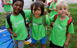 a group of children wearing backpacks