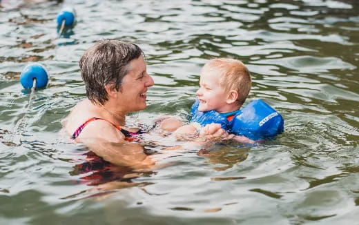 a man and a baby in the water