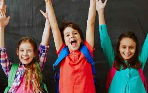a group of people raising their hands