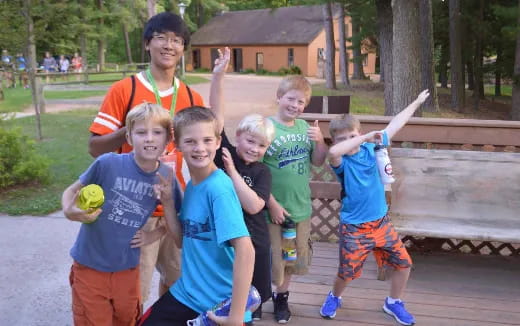 a group of kids posing for a photo