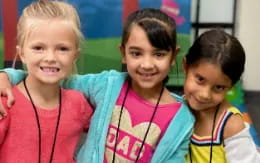 a group of children smiling