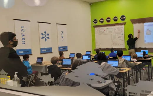 a group of people in a classroom