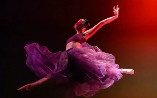 a person dancing on a stage